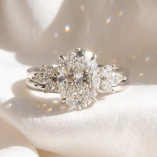 White Gold Oval Three‑Stone Style Bridal Set, Marquise Side Stone Moissanite Stacking Rings